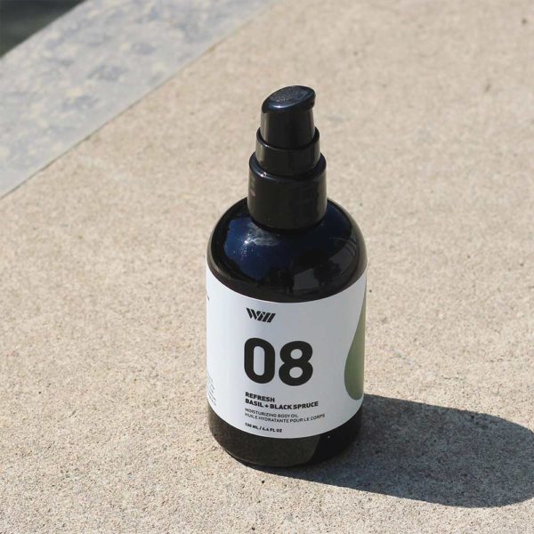 08 Refresh Moisturizing Body Oil on Stone Surface with Drop Shadow