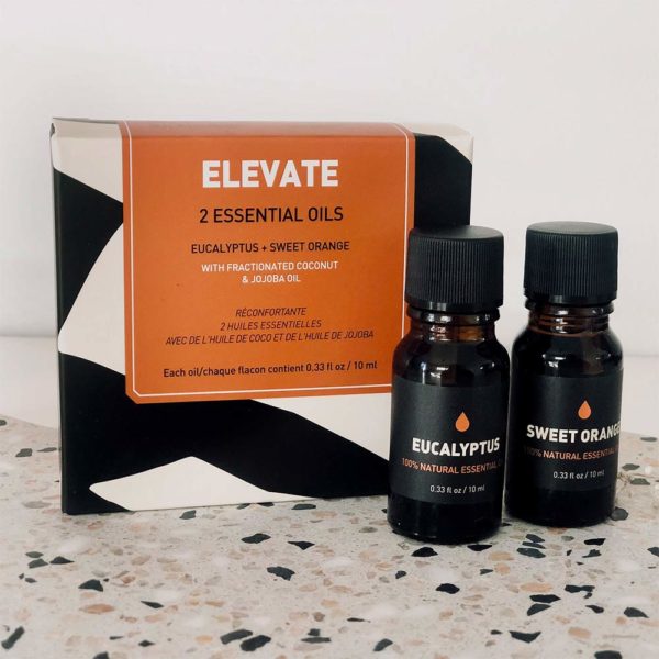 Elevate Essential Oil Set Two Pack 10ml Each on Table