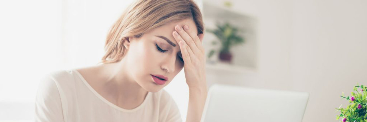 Woman Suffering Because of Headache