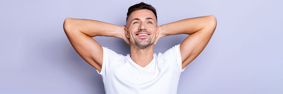 Man Smiling Stretching his Arms